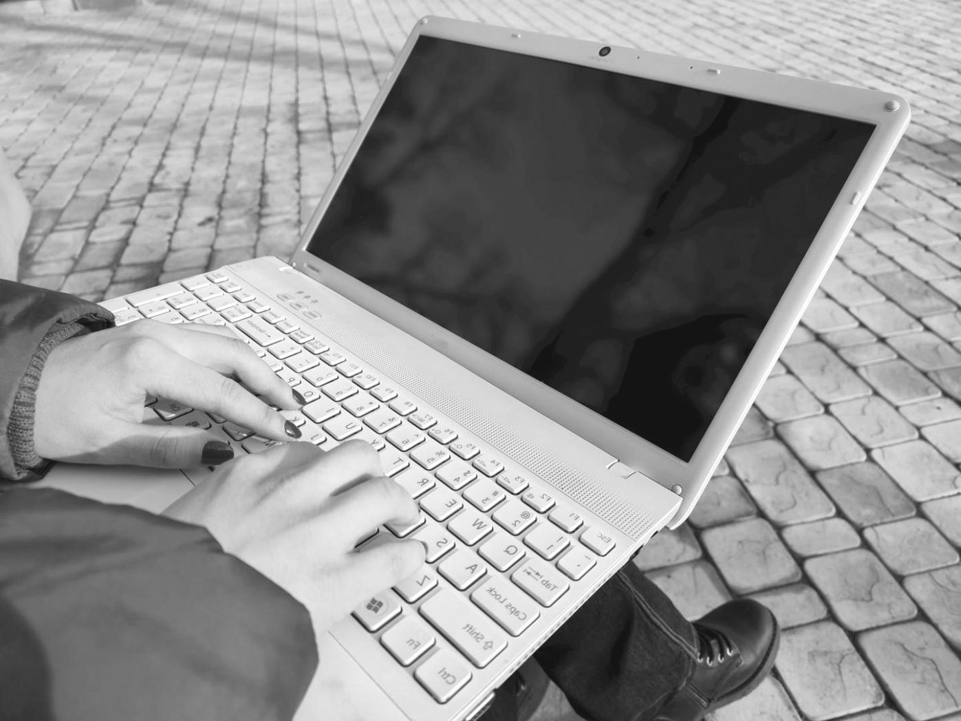 Professional trader analyzing market trends on advanced trading platform with multiple chart displays