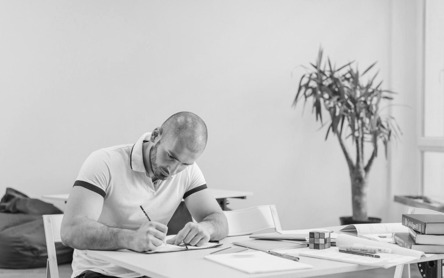 Investment analysis workspace with financial charts and documents